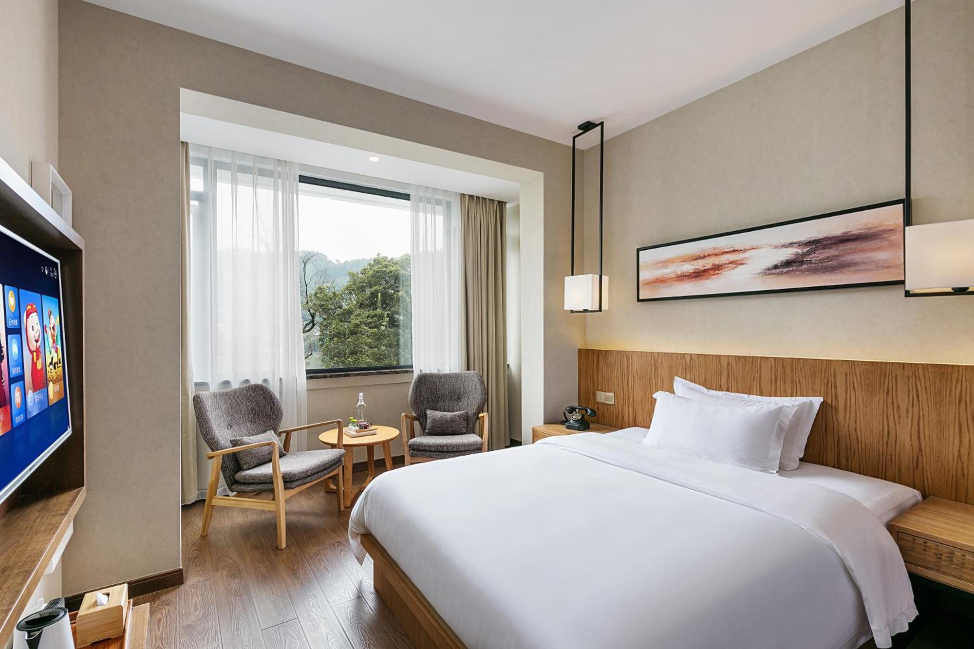 Hangzhou Puyu Travelling With Hotel Екстериор снимка